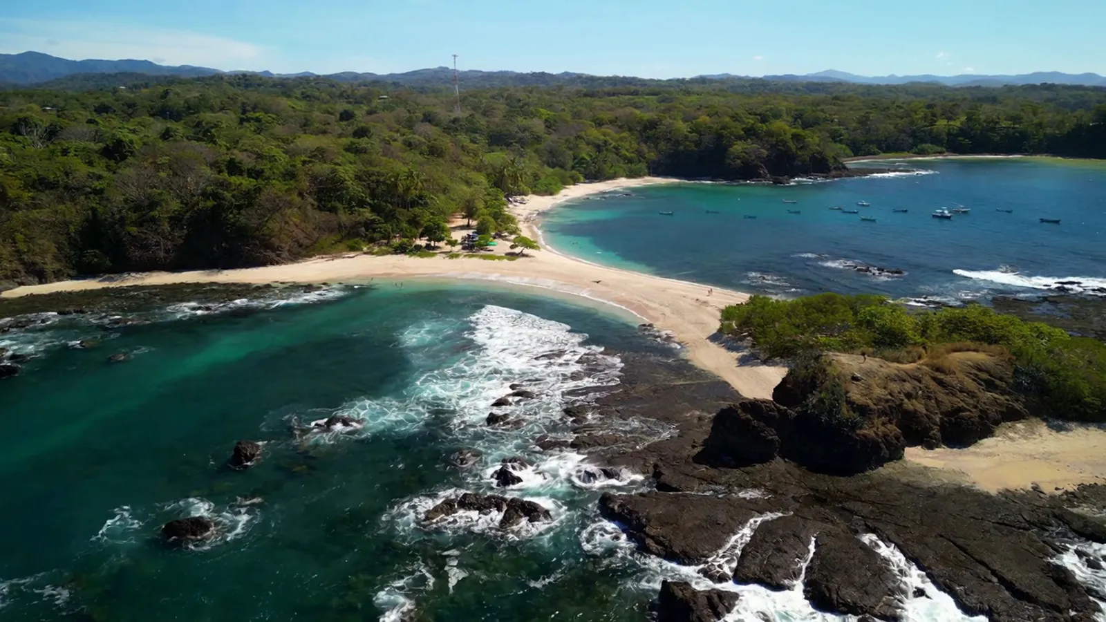 Aerial still of Playa San Juanillo, pulled from the drone footage